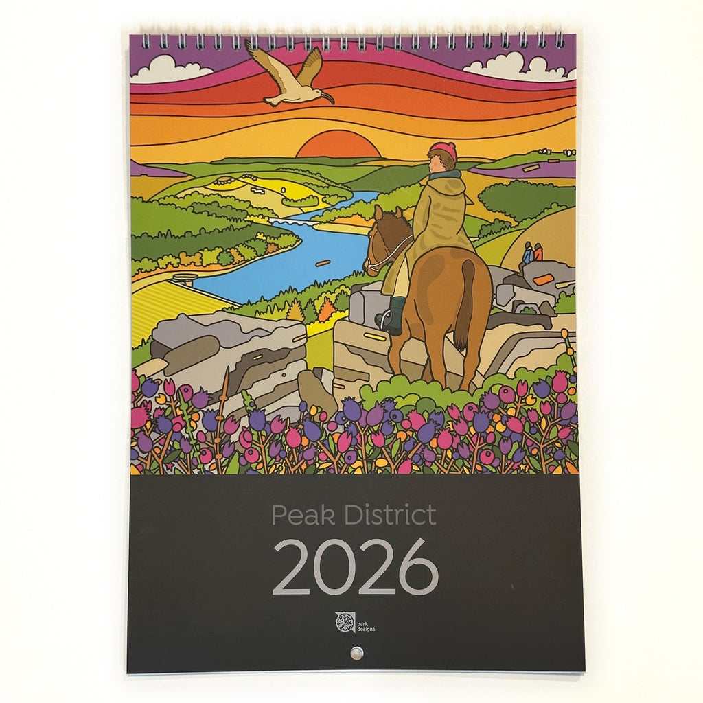 Calendar cover with a colorful illustration of a person on a horse in the Peak District, featuring the year 2026.